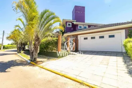 Casa com 4 dormitórios à venda, 350 m² por R$ 1.800.000,00 - Condomínio Cantegril - Viamão/RS