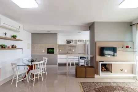 Parigi de 1 dormitório com suíte de 57 m2, todo mobiliado, lareira, churrasqueira. Entrar e morar.
