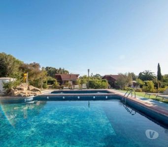 VENDO PARCELA CON CABAÑAS CONDOMINIO DE ALGARROBO
